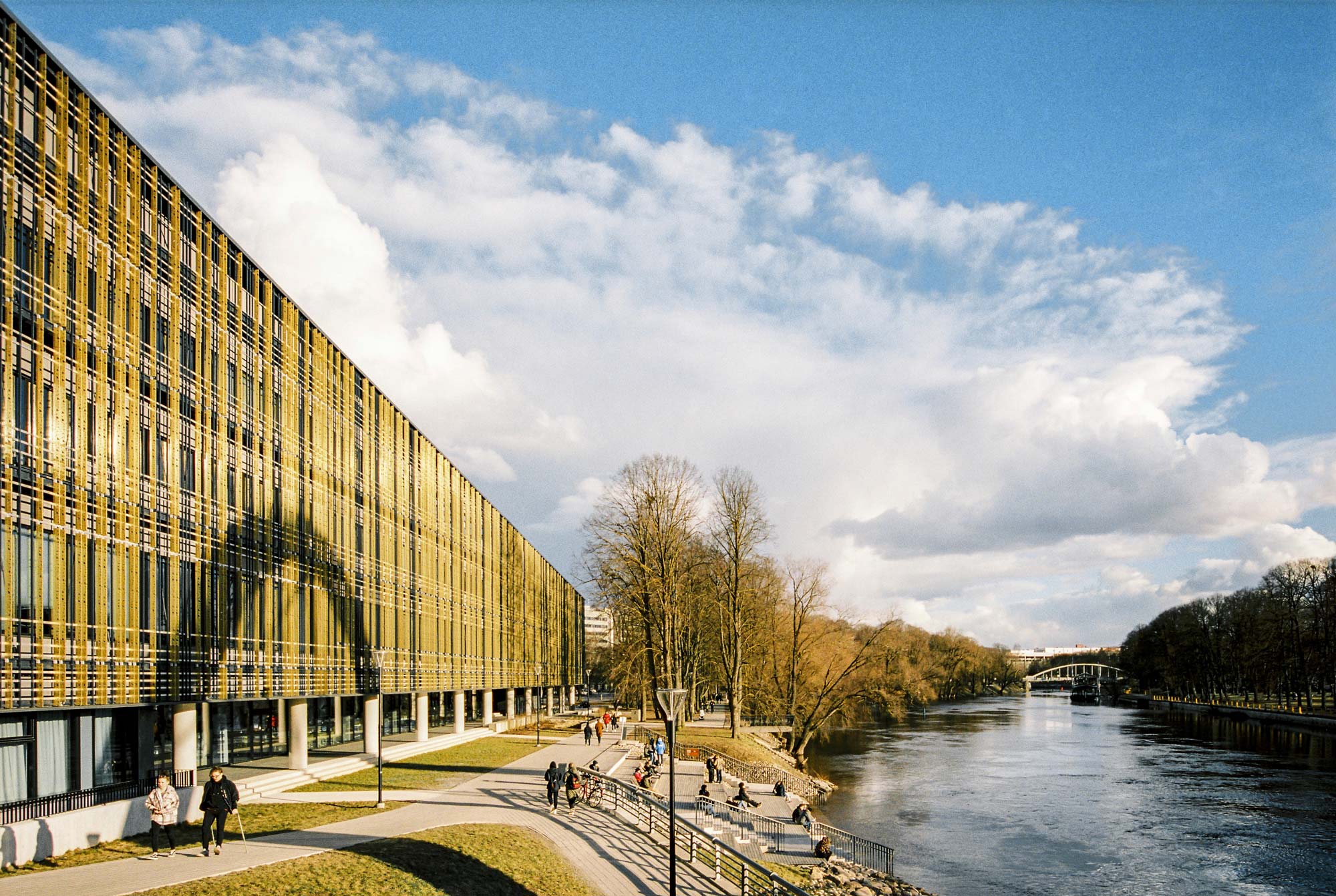 Golden building in Tartu, Estonia facing the river