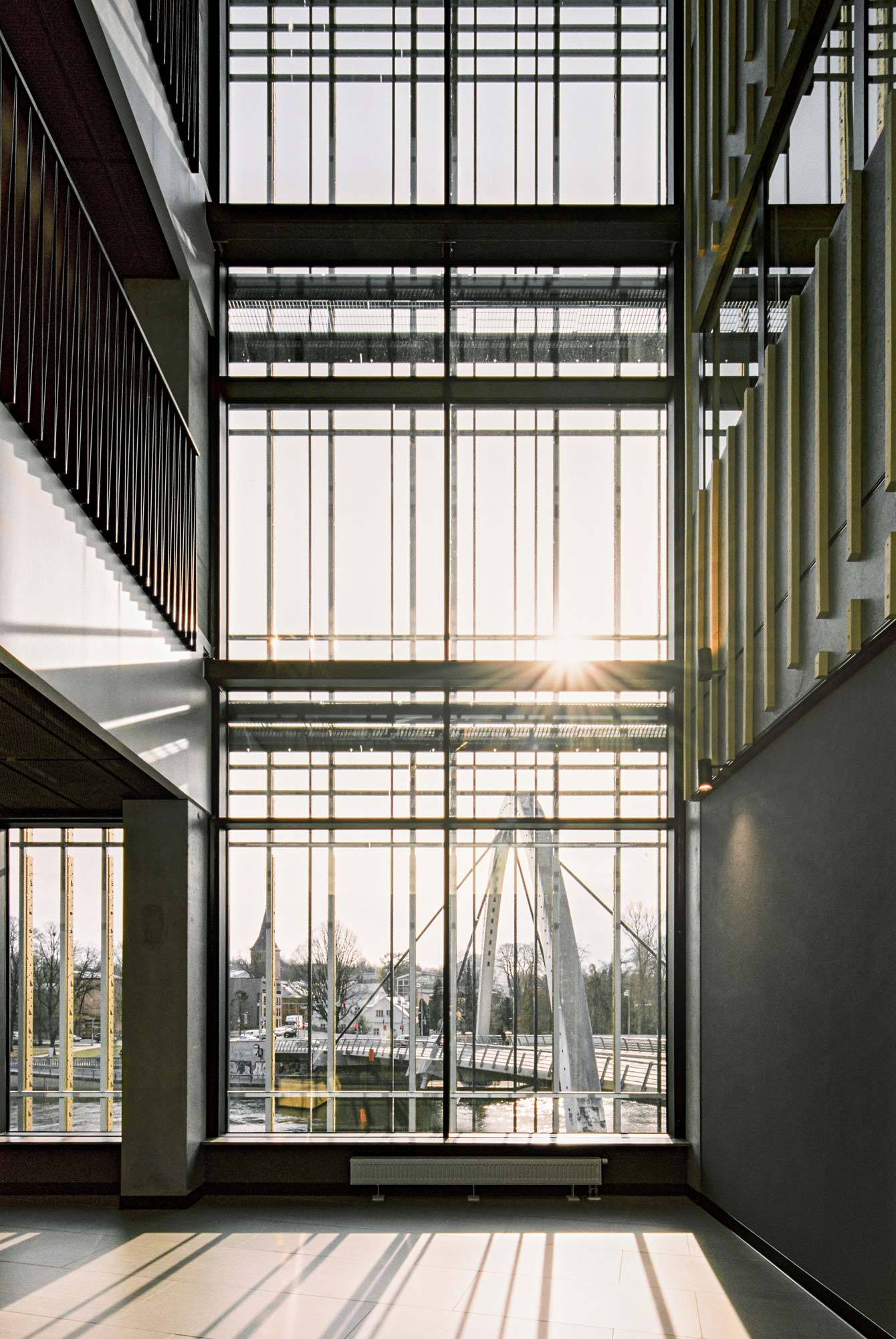 Long glass window with views over the river in Tartu, Estonia