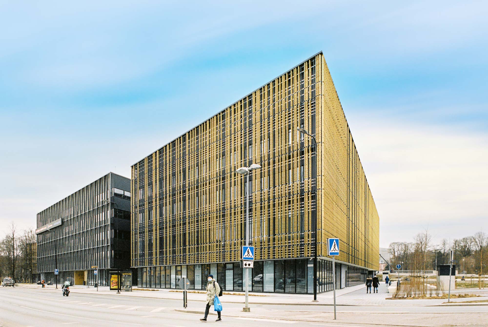 Modern building in Tartu, Estonia with golden cladding