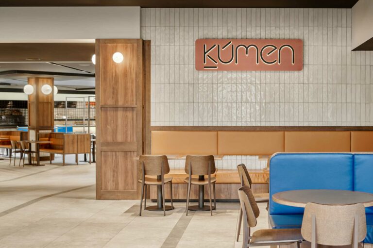 Food court with mustard leather seats and brown chairs