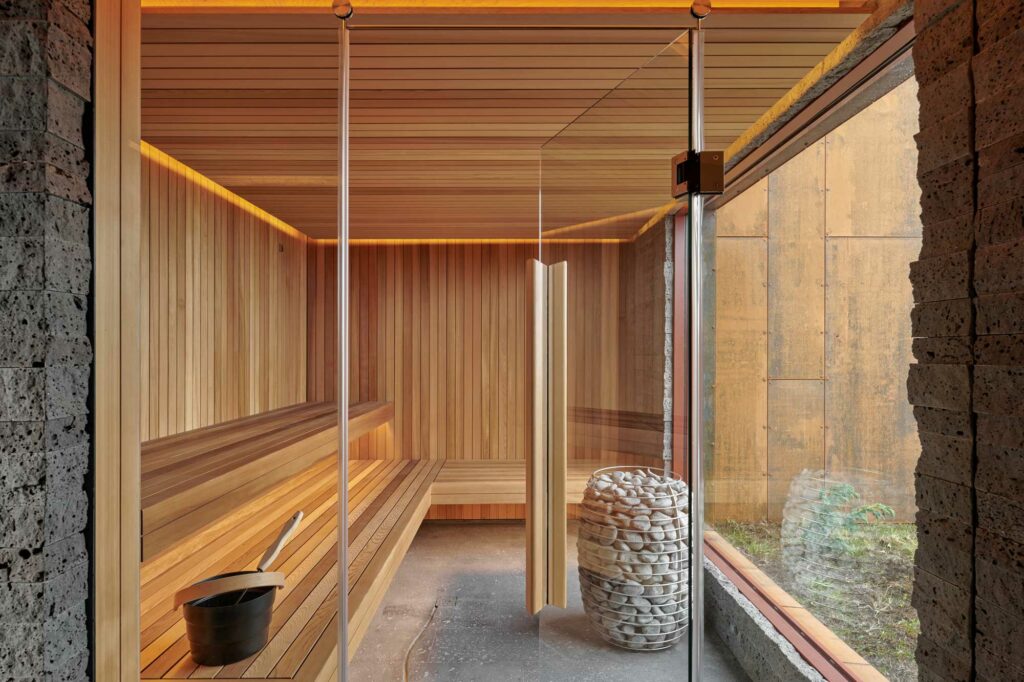 Wooden sauna with minimalistic design and large window